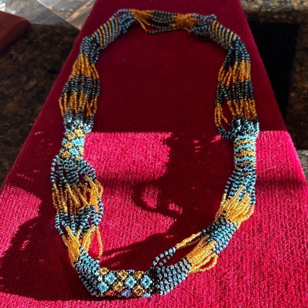 Elegant Beaded Necklace in Blue and Gold